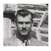 Elroy Murphy Old photo of a dark-haired man in a jacket and tie